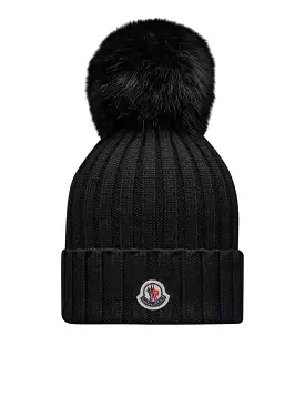 Beanie with pom poms